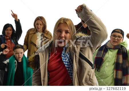 Diverse group passionately protesting for human rights and social justice in economic crisis context Diverse group passionately protesting for human rights and social justice in economic crisis context 127682119
