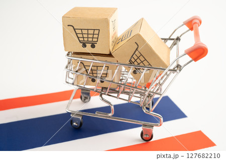 Thailand shopping, Shopping cart box on Venezuala flag, import export, finance commerce. 127682210