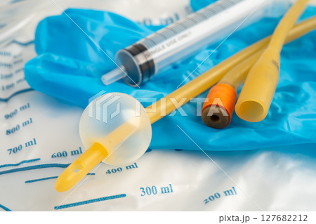 Foley catheter and urine drainage bag collect urine for disability or patient in hospital. Foley catheter and urine drainage bag collect urine for disability or patient in hospital. 127682212