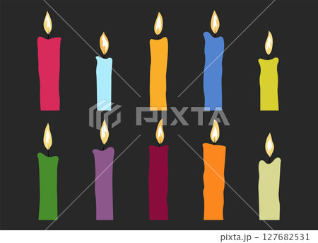 Colorful candles on a black background. Bright-colored lit candles set. 127682531