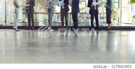 Close up team of managers standing in line, row for group business professionals portrait together 127682903