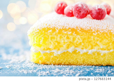 Enjoy sweet cake with fresh berries and powdered sugar, food photography 127683144