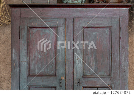 Old purple wooden rural closet background 127684072