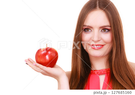 Woman charming girl colorful makeup holds apple fruit Woman charming girl colorful makeup holds apple fruit 127685160