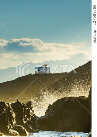 Seaside view with caravan camping on cliff 127685369