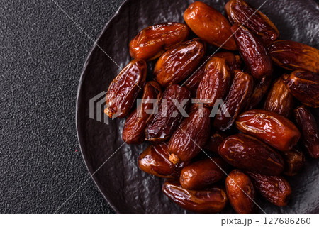 Dried tropical date fruit as an ingredient for fresh organic diet food 127686260