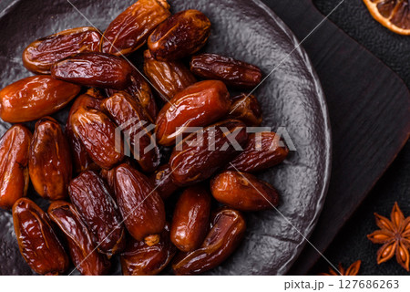Dried tropical date fruit as an ingredient for fresh organic diet food 127686263