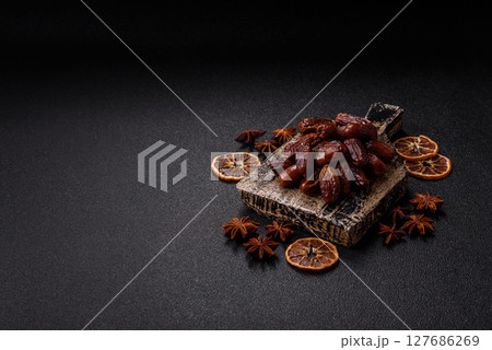 Dried tropical date fruit as an ingredient for fresh organic diet food Dried tropical date fruit as an ingredient for fresh organic diet food 127686269
