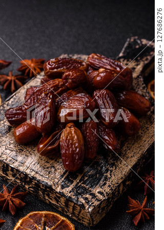 Dried tropical date fruit as an ingredient for fresh organic diet food Dried tropical date fruit as an ingredient for fresh organic diet food 127686276