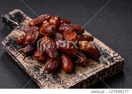 Dried tropical date fruit as an ingredient for fresh organic diet food Dried tropical date fruit as an ingredient for fresh organic diet food 127686277