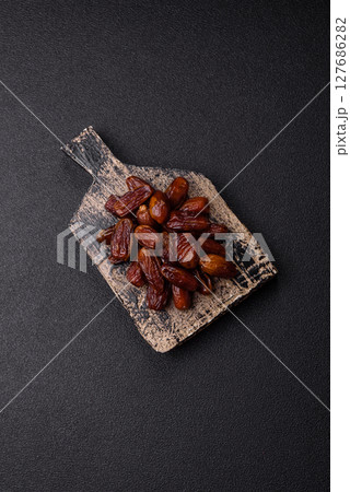 Dried tropical date fruit as an ingredient for fresh organic diet food Dried tropical date fruit as an ingredient for fresh organic diet food 127686282