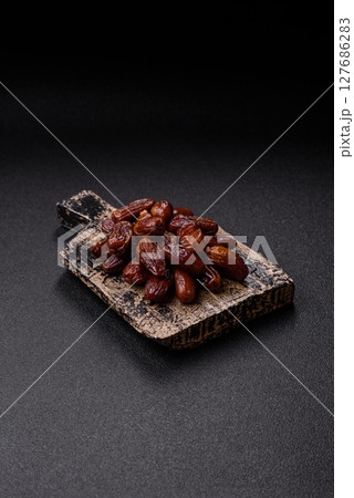 Dried tropical date fruit as an ingredient for fresh organic diet food Dried tropical date fruit as an ingredient for fresh organic diet food 127686283
