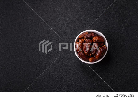 Dried tropical date fruit as an ingredient for fresh organic diet food 127686285