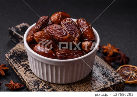 Dried tropical date fruit as an ingredient for fresh organic diet food Dried tropical date fruit as an ingredient for fresh organic diet food 127686292