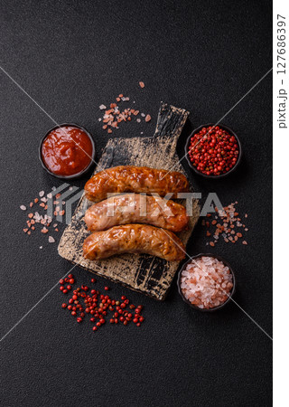 Grilled pork or beef sausages 127686397