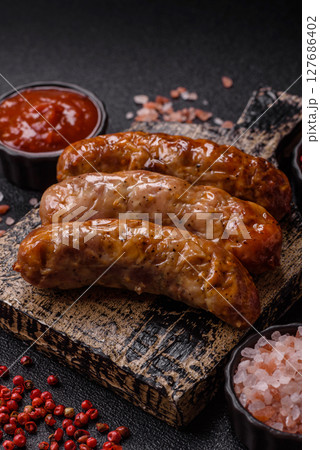 Grilled pork or beef sausages Grilled pork or beef sausages 127686402