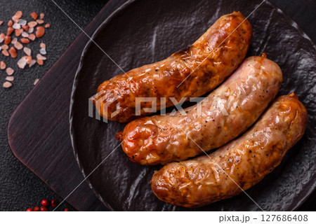 Grilled pork or beef sausages Grilled pork or beef sausages 127686408