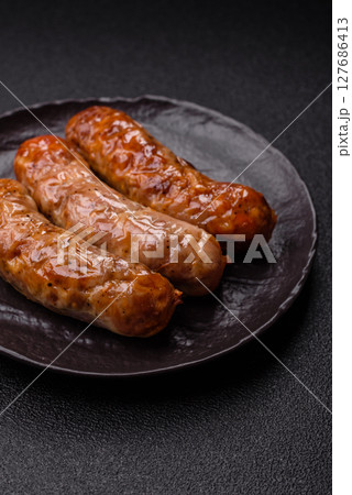 Grilled pork or beef sausages Grilled pork or beef sausages 127686413