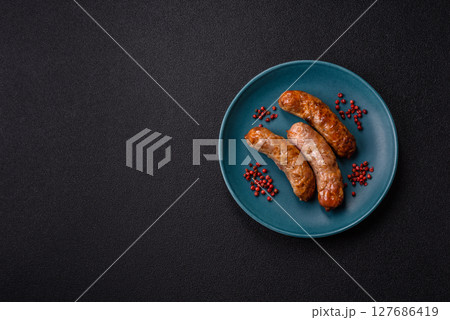 Grilled pork or beef sausages Grilled pork or beef sausages 127686419