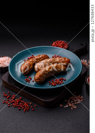 Grilled pork or beef sausages Grilled pork or beef sausages 127686433