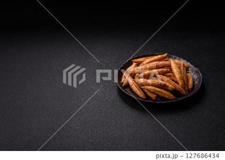 Cinnamon flavored biscuits or breadsticks Cinnamon flavored biscuits or breadsticks 127686434