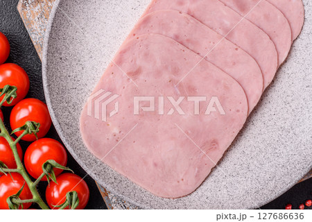 Eating ham and pork slices for the holiday table 127686636