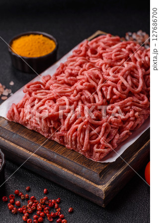 Ground beef mince fresh raw with salt and spices Ground beef mince fresh raw with salt and spices 127686700