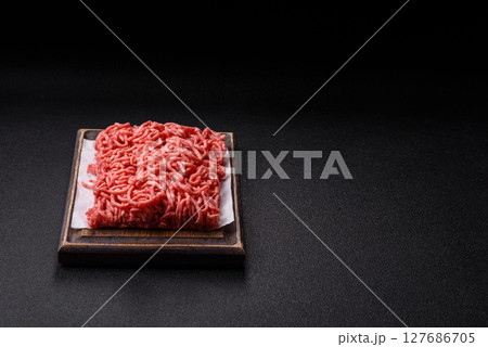 Ground beef mince fresh raw with salt and spices Ground beef mince fresh raw with salt and spices 127686705