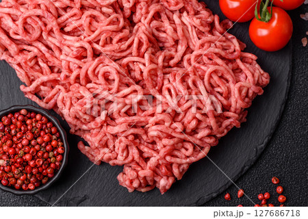 Ground beef mince fresh raw with salt and spices 127686718