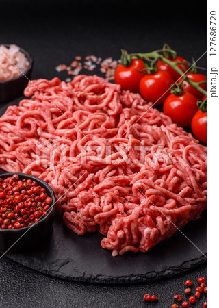 Ground beef mince fresh raw with salt and spices 127686720