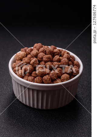 Cereal chocolate corn balls in a bowl 127686774