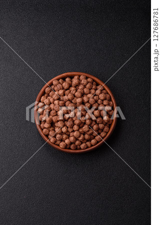 Cereal chocolate corn balls in a bowl 127686781