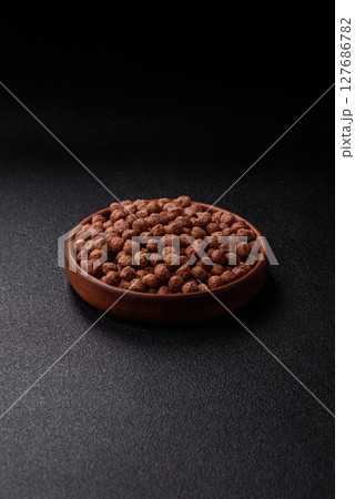 Cereal chocolate corn balls in a bowl 127686782