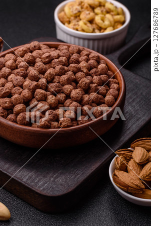 Cereal chocolate corn balls in a bowl Cereal chocolate corn balls in a bowl 127686789