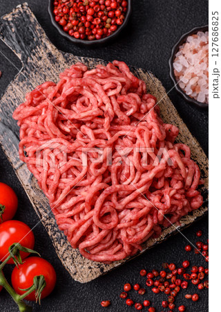 Ground beef mince fresh raw with salt and spices 127686825