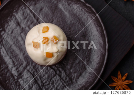 Easter sweet cake covered with icing with fruit and candied fruits Easter sweet cake covered with icing with fruit and candied fruits 127686870