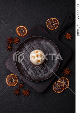 Easter sweet cake covered with icing with fruit and candied fruits Easter sweet cake covered with icing with fruit and candied fruits 127686874