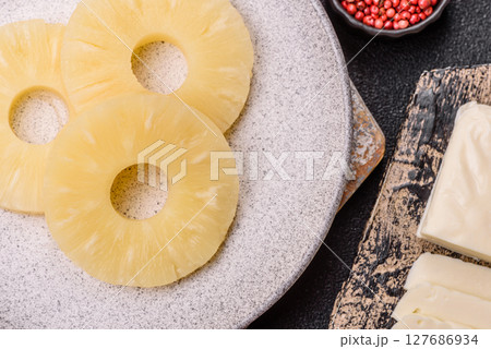 Tropical fruit pineapple in rings or slices tinned sweet 127686934