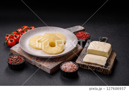 Tropical fruit pineapple in rings or slices tinned sweet 127686937
