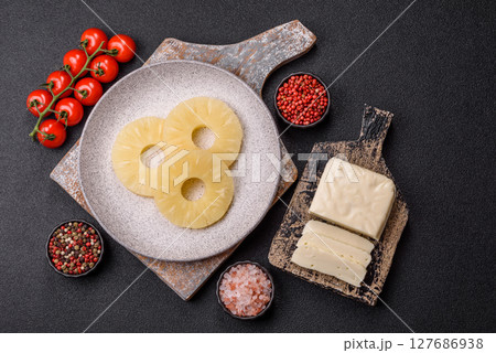 Tropical fruit pineapple in rings or slices tinned sweet 127686938