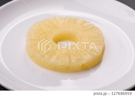 Tropical fruit pineapple in rings or slices tinned sweet Tropical fruit pineapple in rings or slices tinned sweet 127686959
