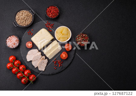 Dairy white mozzarella cheese sliced 127687122