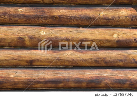 log wall. light wooden wall. environmentally friendly house. wooden blockhouse. wood fibers. 127687346
