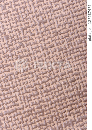 Empty ceramic plate on a monochrome brown background 127687473