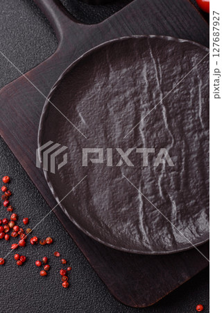 Empty plate with fork, cutlery for dinner table 127687927