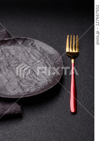 Empty plate with fork, cutlery for dinner table Empty plate with fork, cutlery for dinner table 127687932