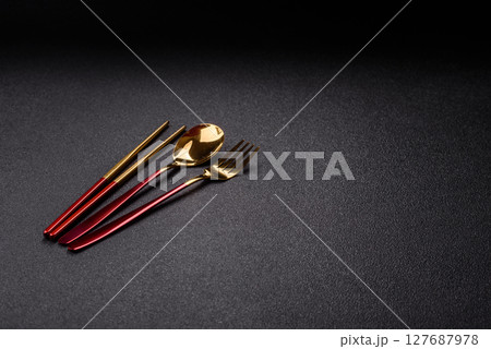 Fork, spoon, chopsticks set of kitchen utensils Fork, spoon, chopsticks set of kitchen utensils 127687978