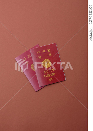Japanese passport for travelling, flying and doing business. Japan document Japanese passport for travelling, flying and doing business. Japan document 127688106