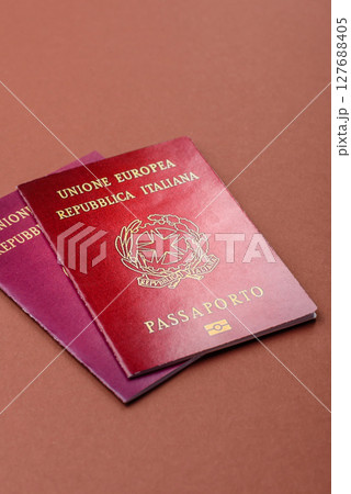 Italy passport for travelling, flying and doing business. Italian document Italy passport for travelling, flying and doing business. Italian document 127688405
