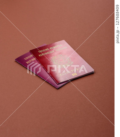 Italy passport for travelling, flying and doing business. Italian document 127688409